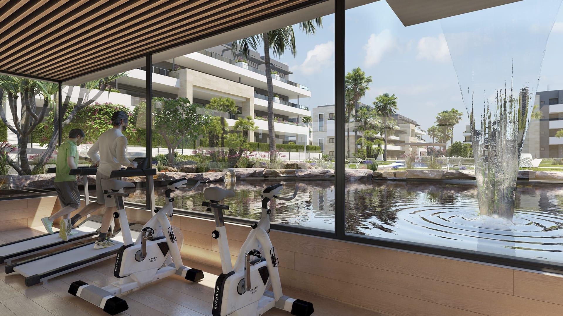 Fitnessruimte met uitzicht op het water